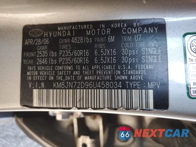 Zdjęcie 14 z 16 samochodu: 2006 HYUNDAI TUCSON GLS VIN:KM8JN72D96U458034 - miniatura
