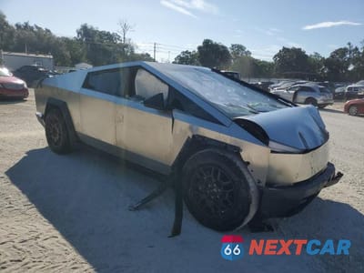 Czwarte zdjęcie samochodu z boku: 2024 TESLA CYBERTRUCK VIN:7G2CEHEE1RA049685 - miniatura
