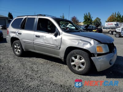 Czwarte zdjęcie samochodu z boku: 2003 GMC ENVOY VIN:1GKDT13S132289463 - miniatura