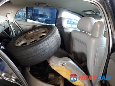 Zdjęcie 10 z 13 samochodu: 2001 BUICK PARK AVENUE VIN:1G4CW54K614278007 - miniatura