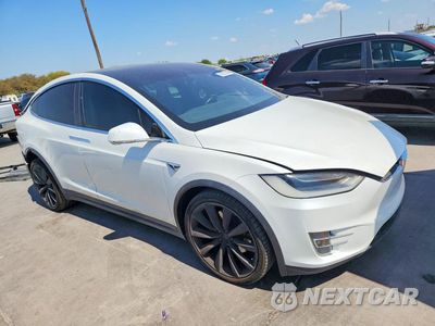 Czwarte zdjęcie samochodu z boku: 2017 TESLA MODEL X VIN:5YJXCBE24HF075714 - miniatura