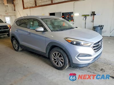 Czwarte zdjęcie samochodu z boku: 2016 HYUNDAI TUCSON SE VIN:KM8J3CA40GU138733 - miniatura