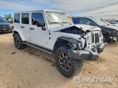 Czwarte zdjęcie samochodu z boku: 2014 JEEP WRANGLER UNLIMITED SPORT VIN:1C4BJWDG3EL150951 - miniatura