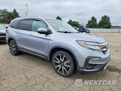 Czwarte zdjęcie samochodu z boku: 2020 HONDA PILOT ELITE VIN:5FNYF6H00LB028122 - miniatura