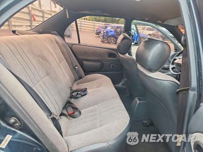 Zdjęcie 10 z 12 samochodu: 1997 TOYOTA COROLLA BASE VIN:1NXBA02E9VZ588653 - miniatura