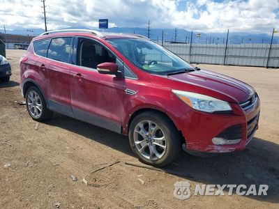 Czwarte zdjęcie samochodu z boku: 2014 FORD ESCAPE TITANIUM VIN:1FMCU9J94EUD81981 - miniatura