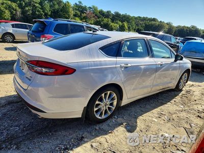 Trzecie zdjęcie samochodu z tyłu: 2017 FORD FUSION SE HYBRID VIN:3FA6P0LU3HR347912 - miniatura