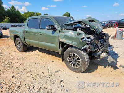 Czwarte zdjęcie samochodu z boku: 2021 TOYOTA TACOMA TRD SPORT VIN:3TMCZ5AN5MM449722 - miniatura