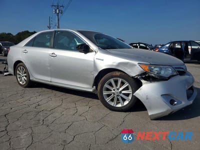 Czwarte zdjęcie samochodu z boku: 2012 TOYOTA CAMRY HYBRID XLE VIN:4T1BD1FK8CU042677 - miniatura