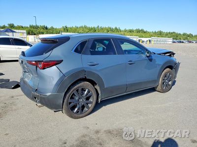 Trzecie zdjęcie samochodu z tyłu: 2024 MAZDA CX-30 PREFERRED VIN:3MVDMBCM9RM682790 - miniatura