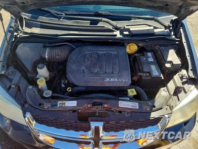 Zdjęcie 12 z 13 samochodu: 2014 DODGE GRAND CARAVAN SE VIN:2C4RDGBG0ER410955 - miniatura
