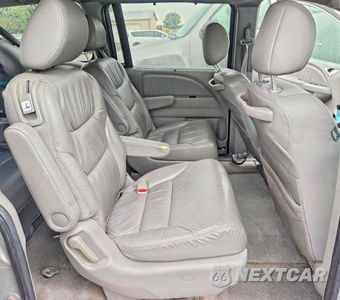 Zdjęcie 11 z 13 samochodu: 2010 HONDA ODYSSEY EXL VIN:5FNRL3H67AB080120 - miniatura