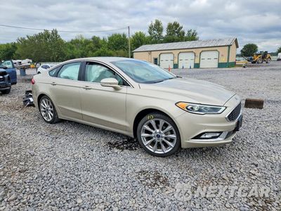 Czwarte zdjęcie samochodu z boku: 2017 FORD FUSION TITANIUM VIN:3FA6P0K95HR186184 - miniatura