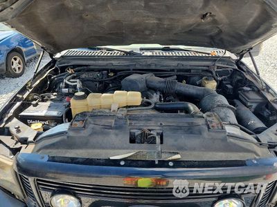 Zdjęcie 12 z 13 samochodu: 2003 FORD EXCURSION LIMITED VIN:1FMNU43S63ED40674 - miniatura
