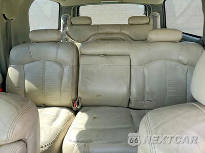 Zdjęcie 10 z 13 samochodu: 2002 CHEVROLET SUBURBAN C1500 VIN:1GNEC16T42J216099 - miniatura