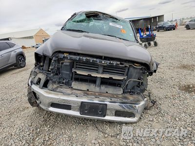 Piąte zdjęcie samochodu w środku: 2014 RAM 1500 SLT VIN:1C6RR6LTXES329054 - miniatura