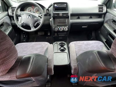 Zdjęcie 8 z 14 samochodu: 2004 HONDA CR-V LX VIN:JHLRD78504C049985 - miniatura