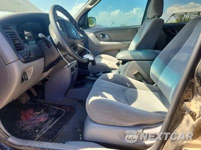 Zdjęcie 7 z 12 samochodu: 2002 MAZDA TRIBUTE LX VIN:4F2YU08172KM44701 - miniatura