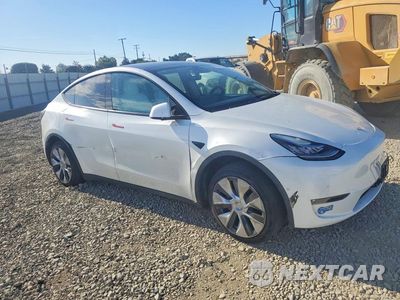 Czwarte zdjęcie samochodu z boku: 2021 TESLA MODEL Y VIN:5YJYGAEE1MF212261 - miniatura