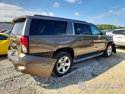 Trzecie zdjęcie samochodu z tyłu: 2015 CHEVROLET SUBURBAN C1500 LT VIN:1GNSCJKC1FR604021 - miniatura