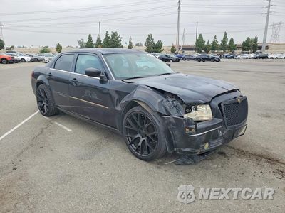 Czwarte zdjęcie samochodu z boku: 2006 CHRYSLER 300 TOURING VIN:2C3KA53G26H348757 - miniatura