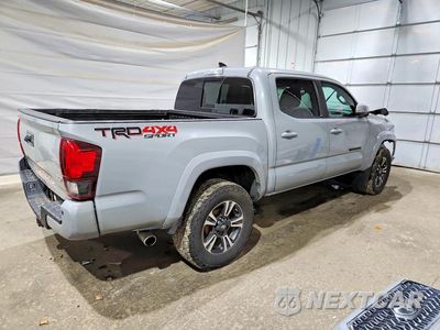 Trzecie zdjęcie samochodu z tyłu: 2019 TOYOTA TACOMA TRD SPORT VIN:3TMCZ5AN1KM218247 - miniatura