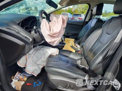 Zdjęcie 7 z 12 samochodu: 2017 FORD FOCUS TITANIUM VIN:1FADP3J25HL238957 - miniatura