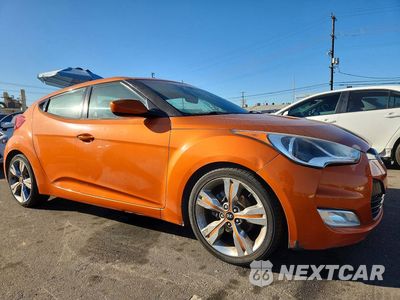Czwarte zdjęcie samochodu z boku: 2012 HYUNDAI VELOSTER BASE VIN:KMHTC6AD6CU041430 - miniatura