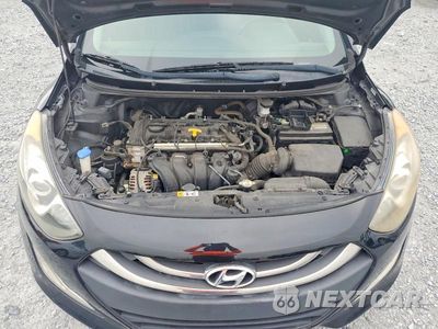 Zdjęcie 12 z 13 samochodu: 2013 HYUNDAI ELANTRA GT BASE VIN:KMHD35LE5DU125387 - miniatura