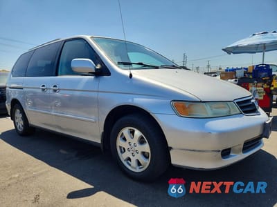 Czwarte zdjęcie samochodu z boku: 2003 HONDA ODYSSEY EXL VIN:5FNRL18033B126982 - miniatura