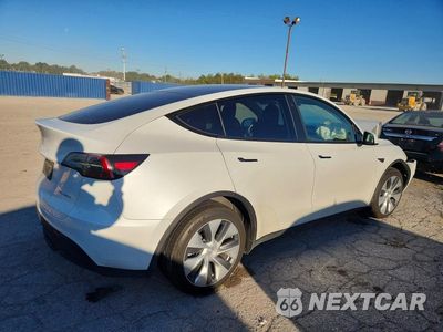 Trzecie zdjęcie samochodu z tyłu: 2023 TESLA MODEL Y VIN:7SAYGDEF2PA049456 - miniatura