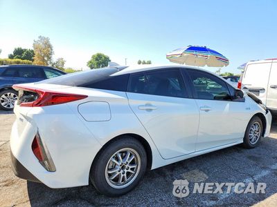 Trzecie zdjęcie samochodu z tyłu: 2021 TOYOTA PRIUS PRIME XLE VIN:JTDKAMFP9M3170802 - miniatura