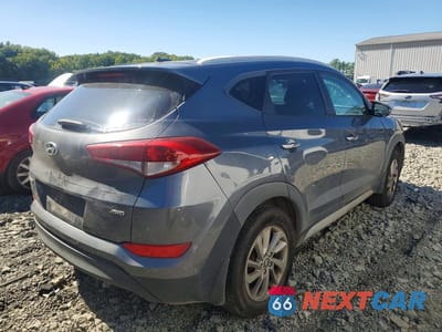 Trzecie zdjęcie samochodu z tyłu: 2017 HYUNDAI TUCSON SE VIN:KM8J3CA40HU444557 - miniatura