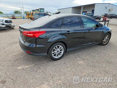 Trzecie zdjęcie samochodu z tyłu: 2015 FORD FOCUS SE VIN:1FADP3F20FL361958 - miniatura