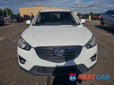 Piąte zdjęcie samochodu w środku: 2016 MAZDA CX-5 TOURING VIN:JM3KE2CY7G0866190 - miniatura