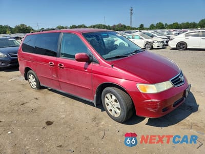 Czwarte zdjęcie samochodu z boku: 2003 HONDA ODYSSEY EXL VIN:5FNRL18033B052057 - miniatura