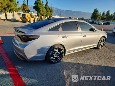 Trzecie zdjęcie samochodu z tyłu: 2016 HYUNDAI SONATA HYBRID SE VIN:KMHE24L15GA036701 - miniatura