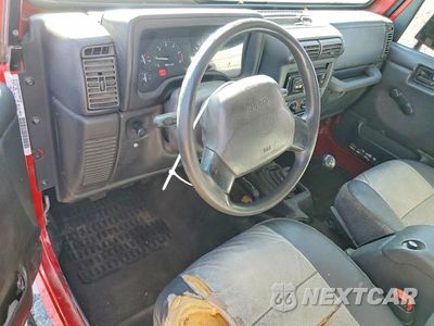 Zdjęcie 8 z 12 samochodu: 2000 JEEP WRANGLER / TJ SE VIN:1J4FA29P3YP709571 - miniatura