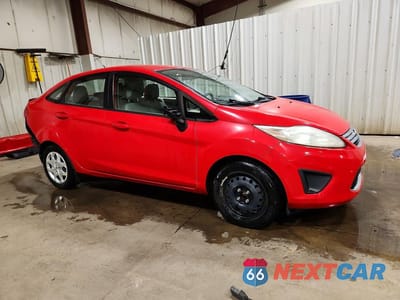Czwarte zdjęcie samochodu z boku: 2012 FORD FIESTA SE VIN:3FADP4BJ3CM160410 - miniatura