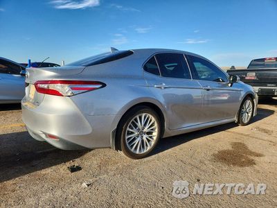 Trzecie zdjęcie samochodu z tyłu: 2019 TOYOTA CAMRY HYBRID XLE VIN:4T1B21HK0KU013272 - miniatura
