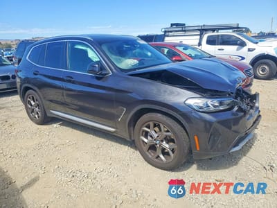 Czwarte zdjęcie samochodu z boku: 2022 BMW X3 XDRIVE30I VIN:5UX53DP01N9M07644 - miniatura