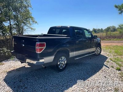 Czwarte zdjęcie samochodu z boku: 2013 FORD F150 SUPERCREW VIN:1FTFW1CT4DFA01157 - miniatura
