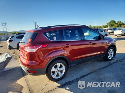 Trzecie zdjęcie samochodu z tyłu: 2016 FORD ESCAPE SE VIN:1FMCU9G93GUB37698 - miniatura