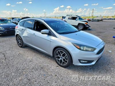 Czwarte zdjęcie samochodu z boku: 2017 FORD FOCUS SEL VIN:1FADP3M28HL299862 - miniatura