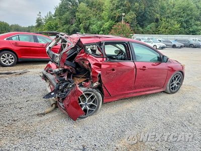 Trzecie zdjęcie samochodu z tyłu: 2016 FORD FOCUS SE VIN:1FADP3K28GL356031 - miniatura