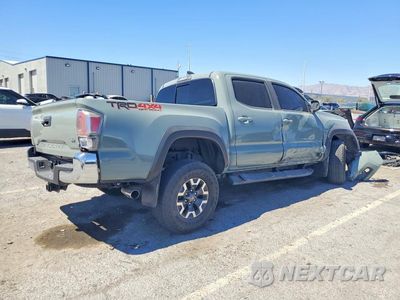 Trzecie zdjęcie samochodu z tyłu: 2022 TOYOTA TACOMA TRD OFF-ROAD VIN:3TMCZ5AN1NM531173 - miniatura