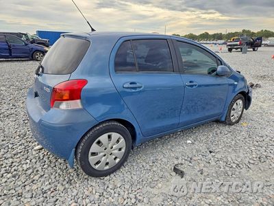Trzecie zdjęcie samochodu z tyłu: 2009 TOYOTA YARIS BASE VIN:JTDKT903X95249100 - miniatura