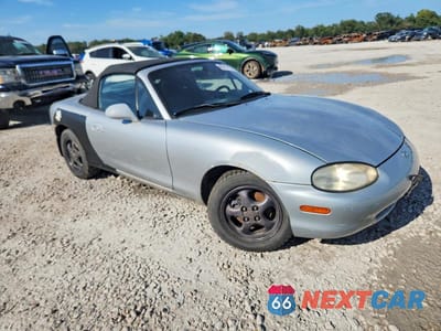 Czwarte zdjęcie samochodu z boku: 1999 MAZDA MX-5 MIATA VIN:JM1NB3536X0111022 - miniatura