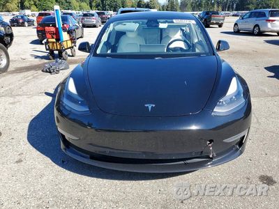 Piąte zdjęcie samochodu w środku: 2021 TESLA MODEL 3 VIN:5YJ3E1EB1MF924940 - miniatura