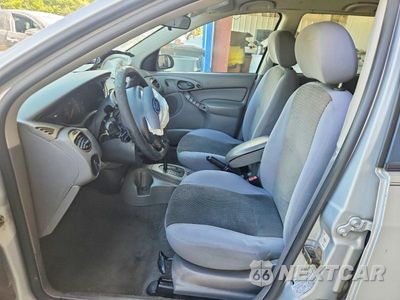 Zdjęcie 7 z 13 samochodu: 2004 FORD FOCUS SE VIN:1FAFP36304W120494 - miniatura